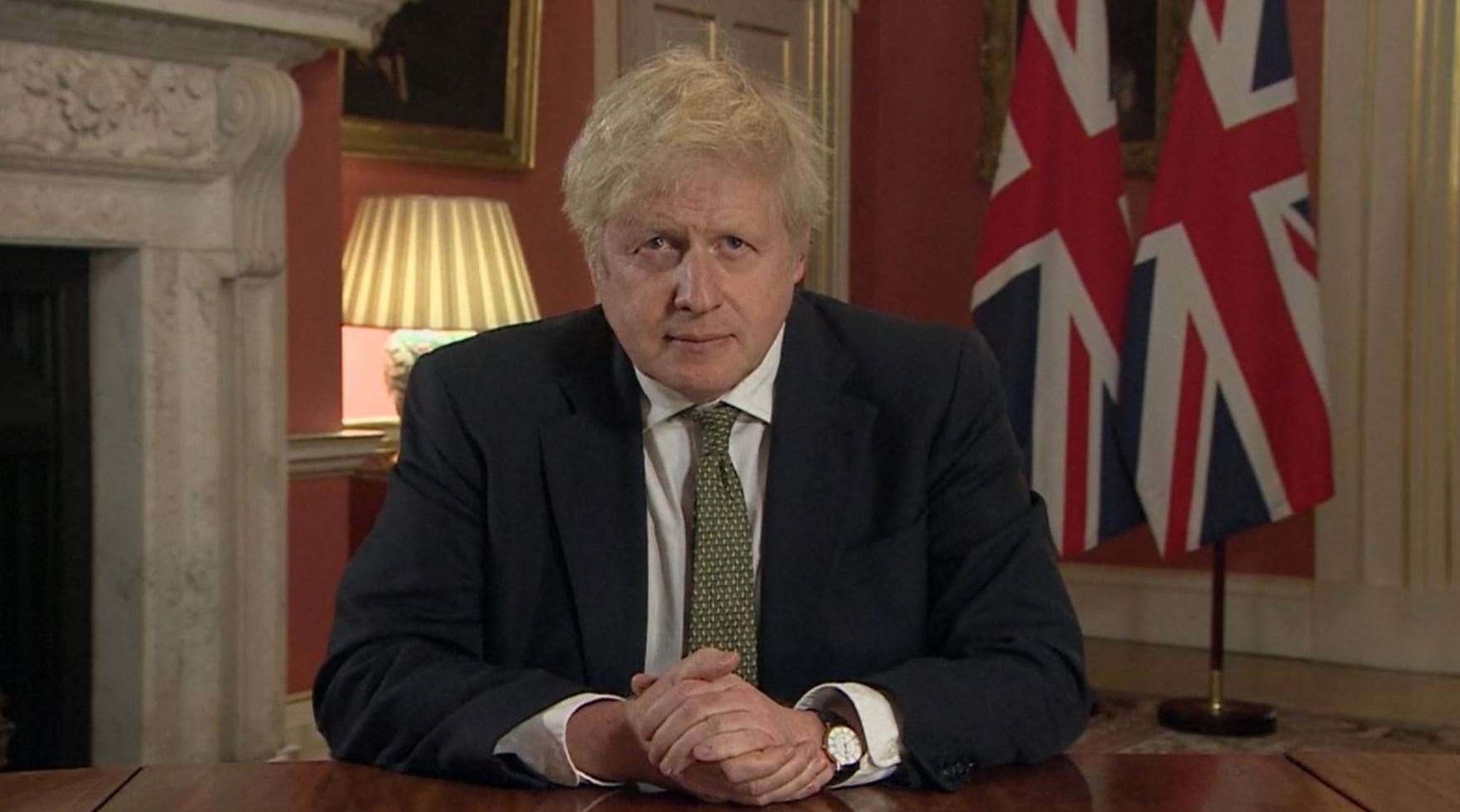 Prime Minister Boris Johnson making a televised address setting out new emergency measures to control the spread of coronavirus in England