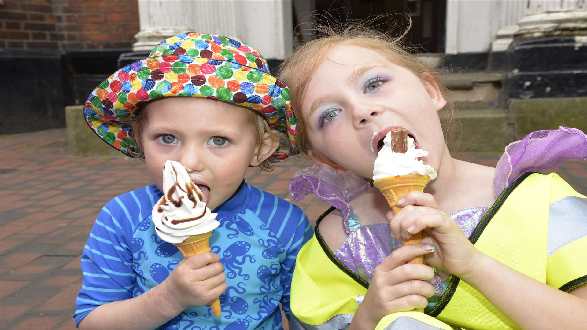 Eleanor Paydon, three, and Alexis Taylor, eight, enjoy an ice cream