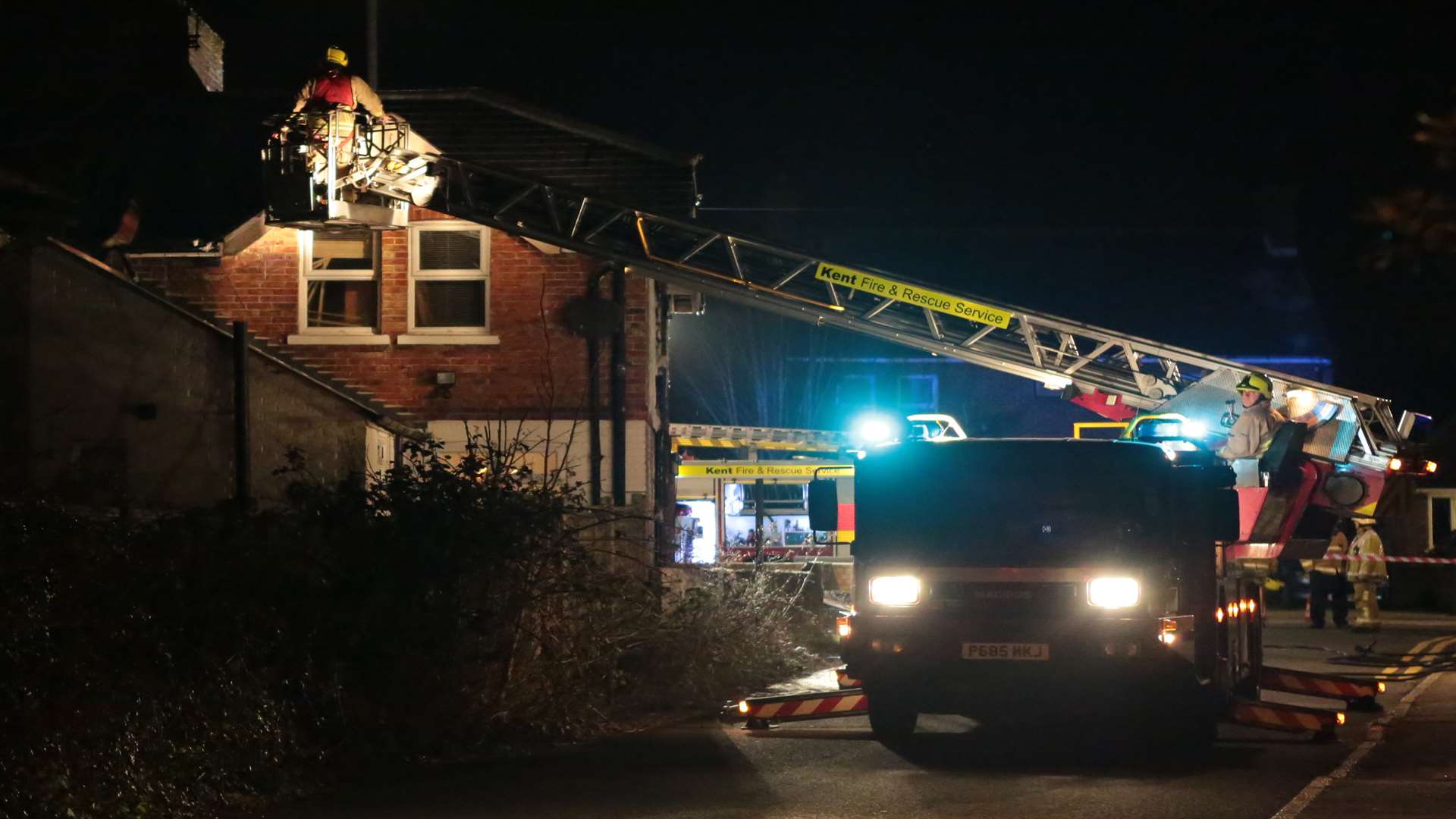 Firefighters in action tackling the blaze