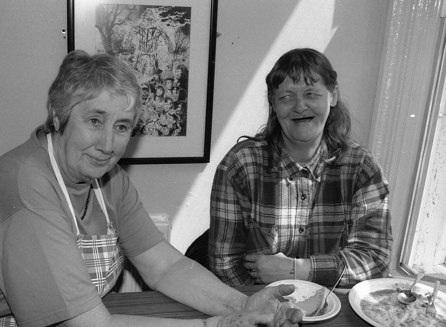 Patricia McCabe chats to a homeless lady at Lenworth House, one of the charity's bases over the years