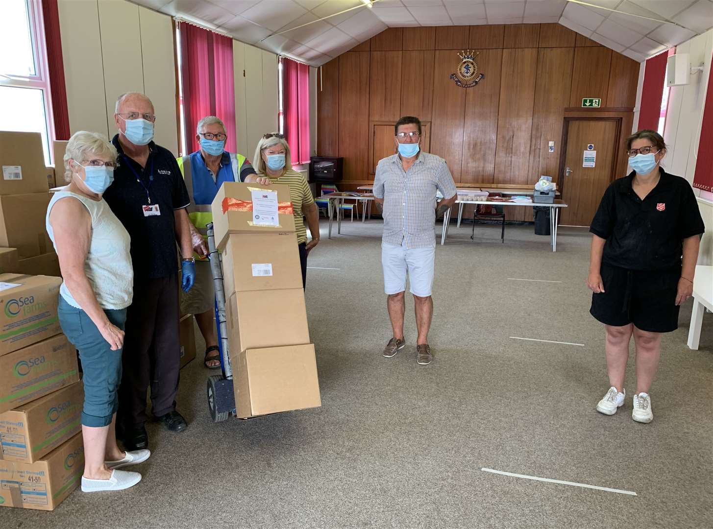 Margaret Murray volunteering with husband, Oasis Academy's Paul Murray, Brian and Val Spoor, the academy's Eddy McEntire and Major Lynne Clifton of the Salvation Army