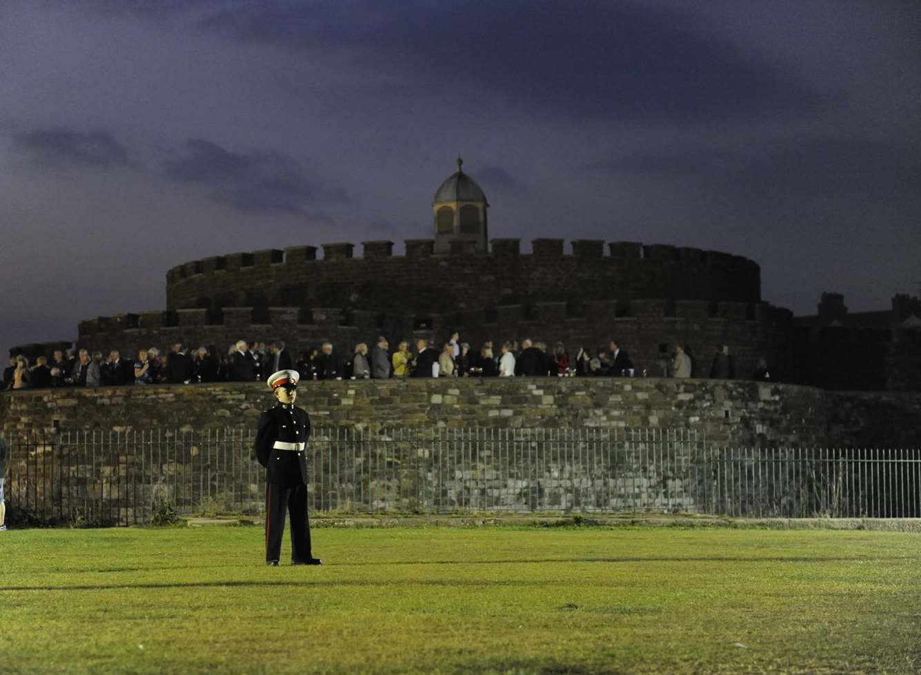 Crowds gathered at Deal Castle to remember the eleven men killed in an IRA bomb 25 years ago