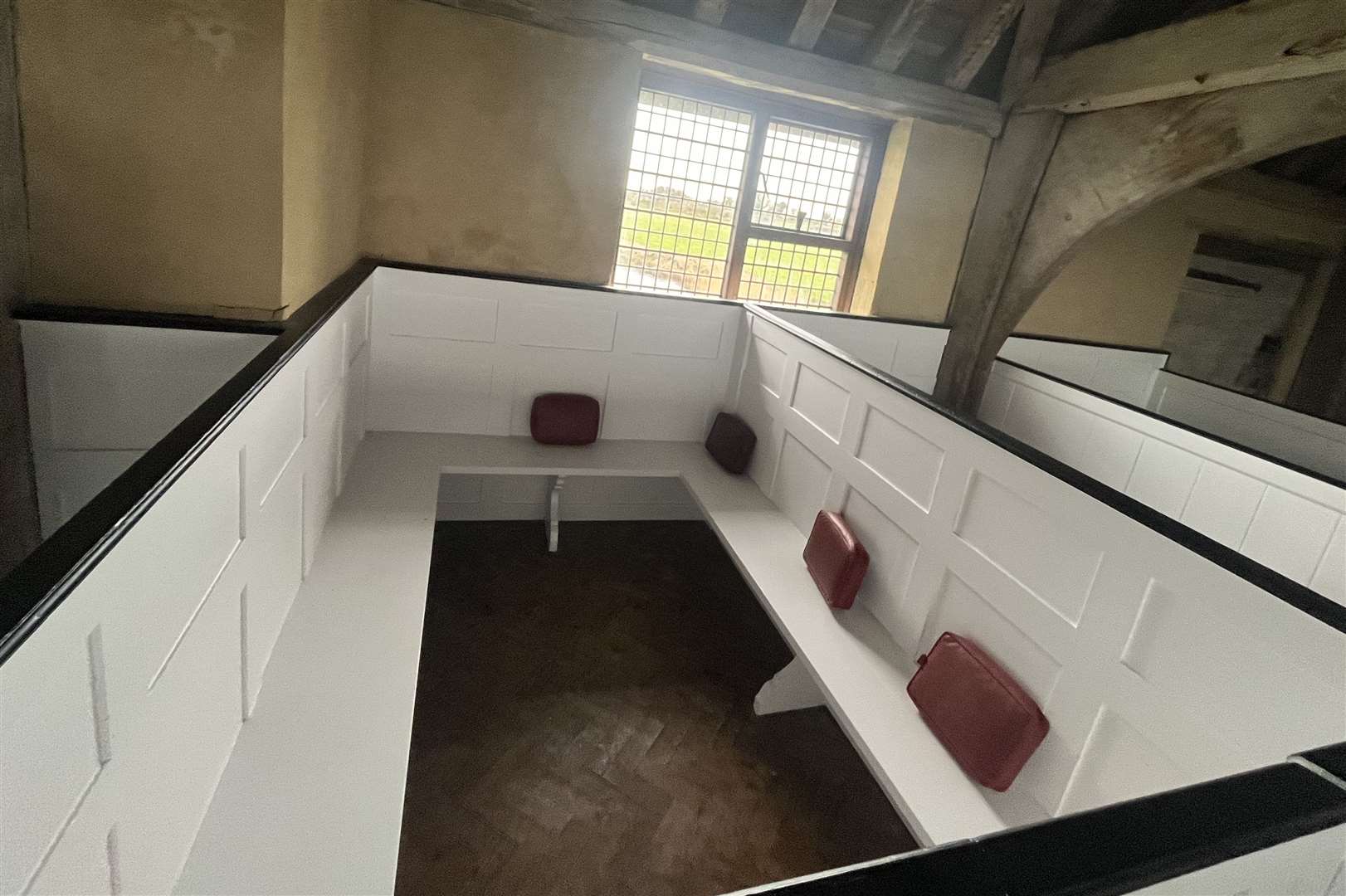 The pews are arranged in rectangles inside St Thomas Becket church in Romney Marsh