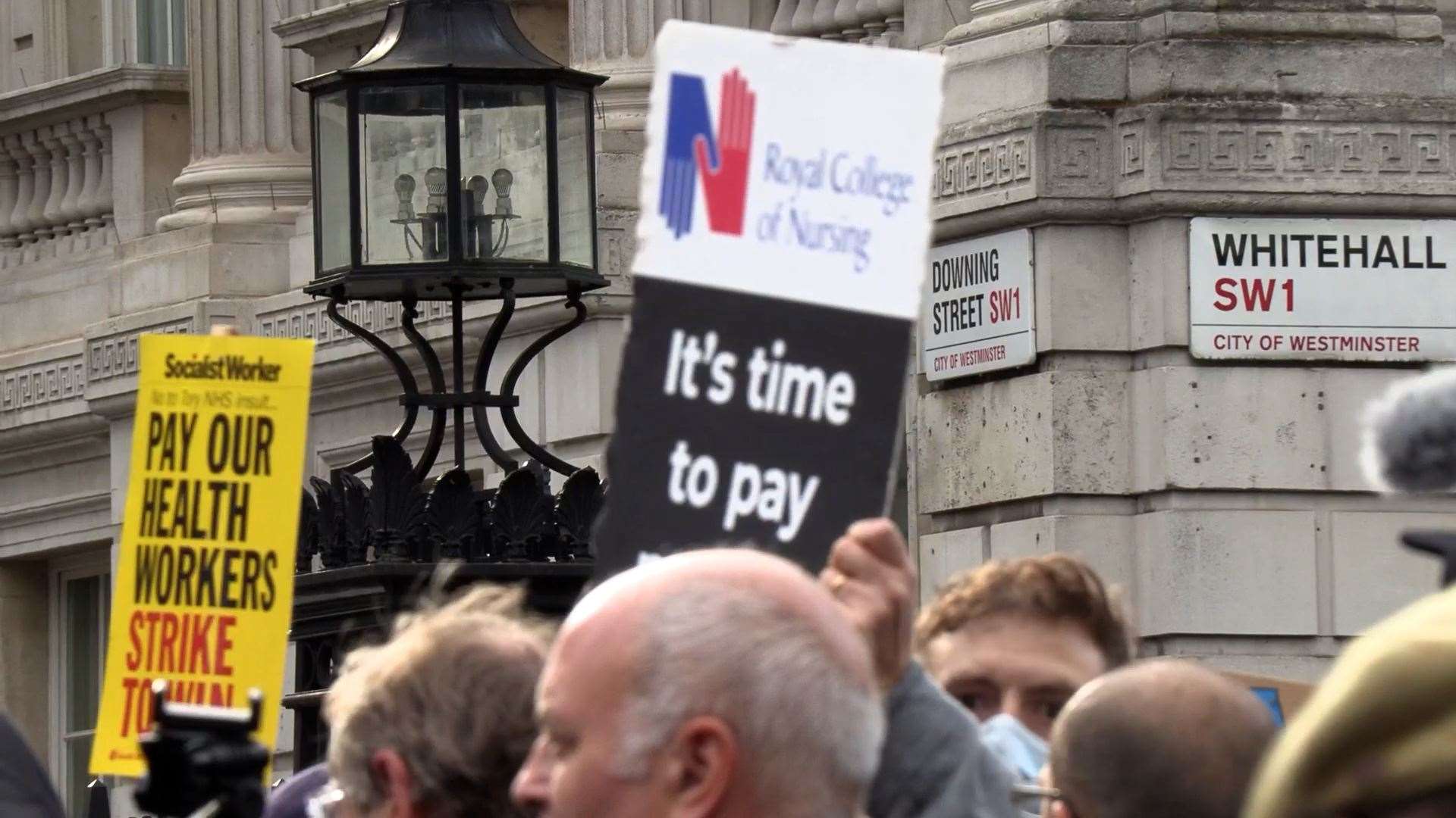 Health workers in Downing Street (PA Video/PA)