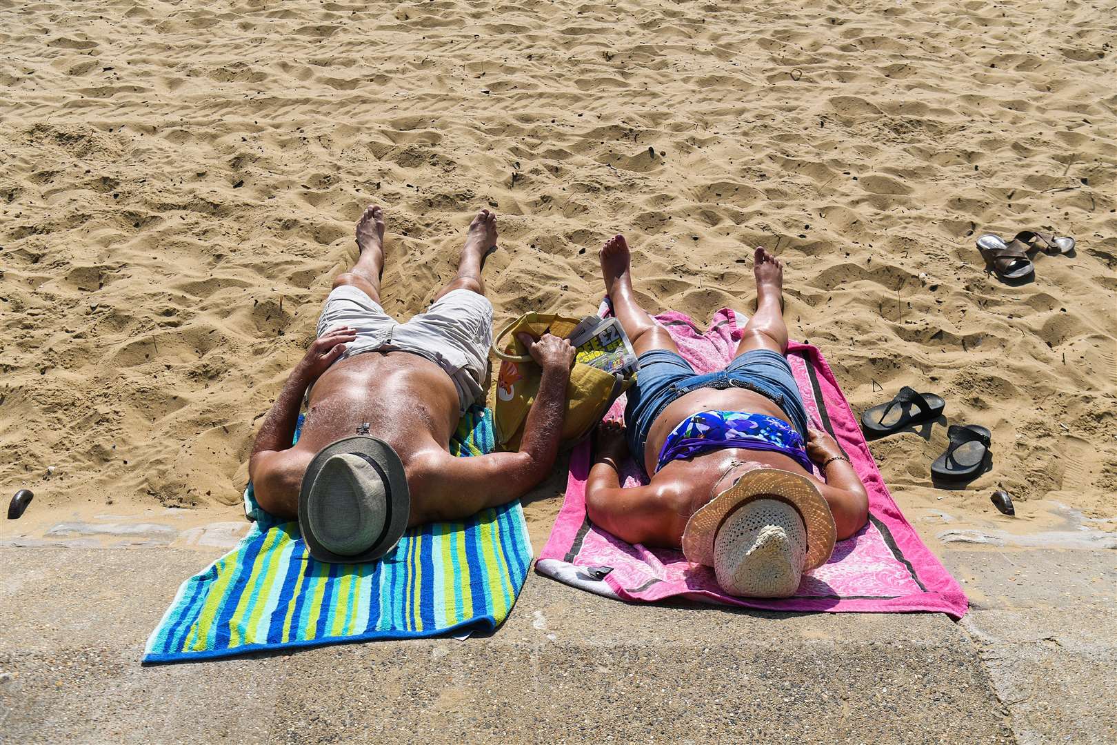 Sunbathers on Bournemouth beach (Kirsty O’Connor/PA)