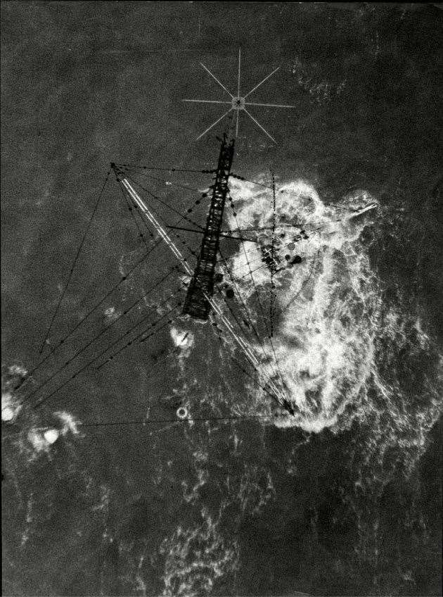 Aerial photograph of the wreck of Radio Caroline's Mi Amigo just showing its mast