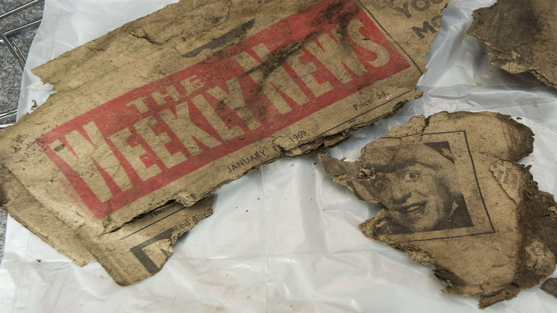 Newspapers from the late 1960s were found in the shelter. Paedophile Jimmy Savile looks out from The Weekly News. Picture: Andy Payton