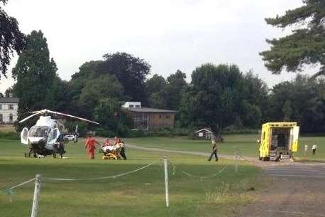 The injured man is taken to an air ambulance after being stabbed. Picture: @Accio_Swift13