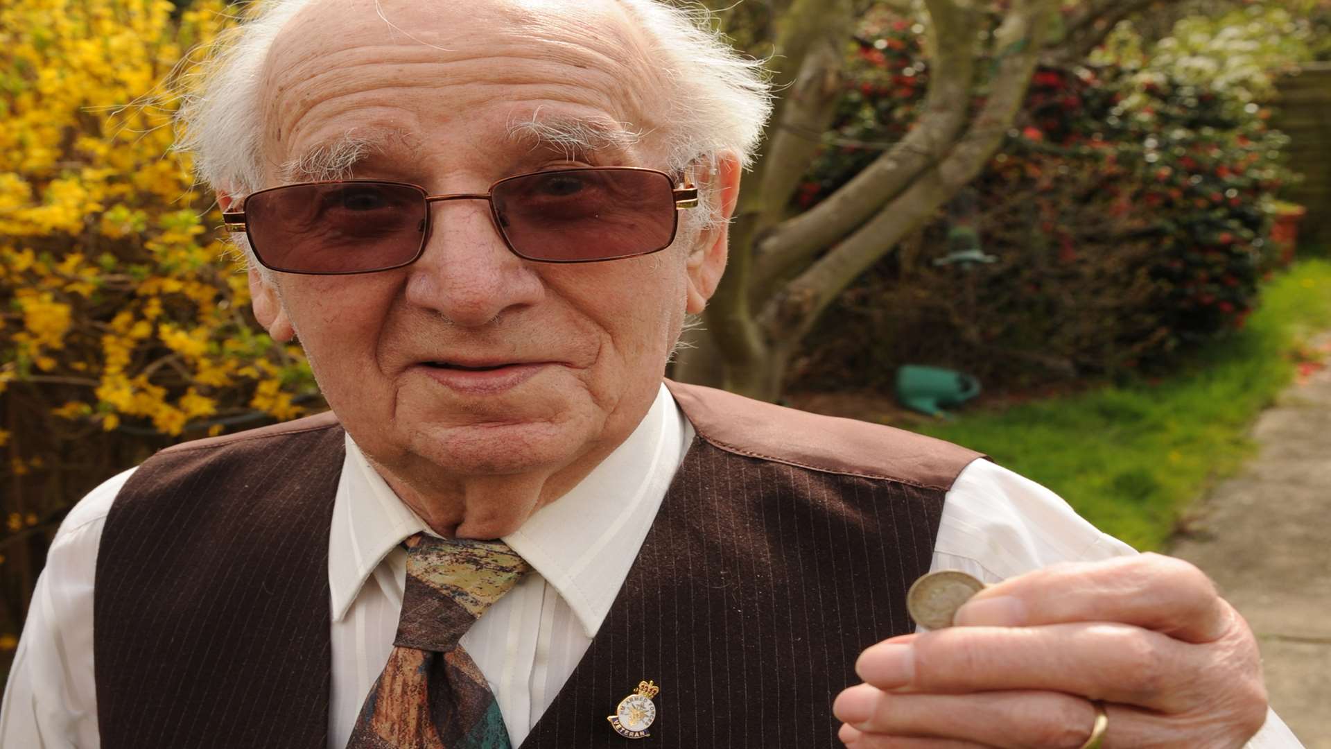 Terence Holmes, a former barber, was paid sixpence by the Duke of Edinburgh for cutting his hair. Picture: Steve Crispe