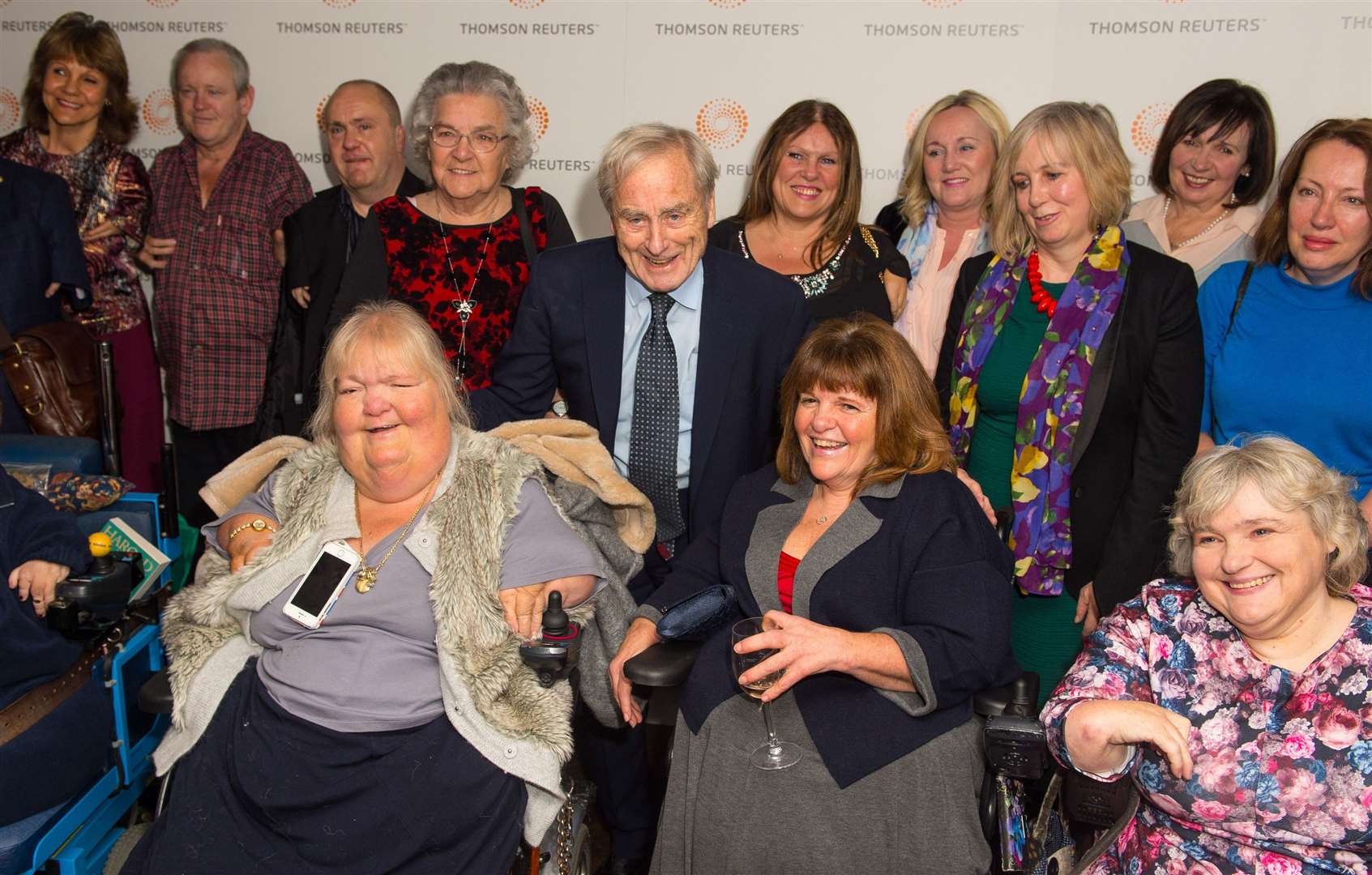 Sir Harold Evans with a group of thalidomide victims at the premiere of Attacking The Devil (Dominic Lipinski/PA)