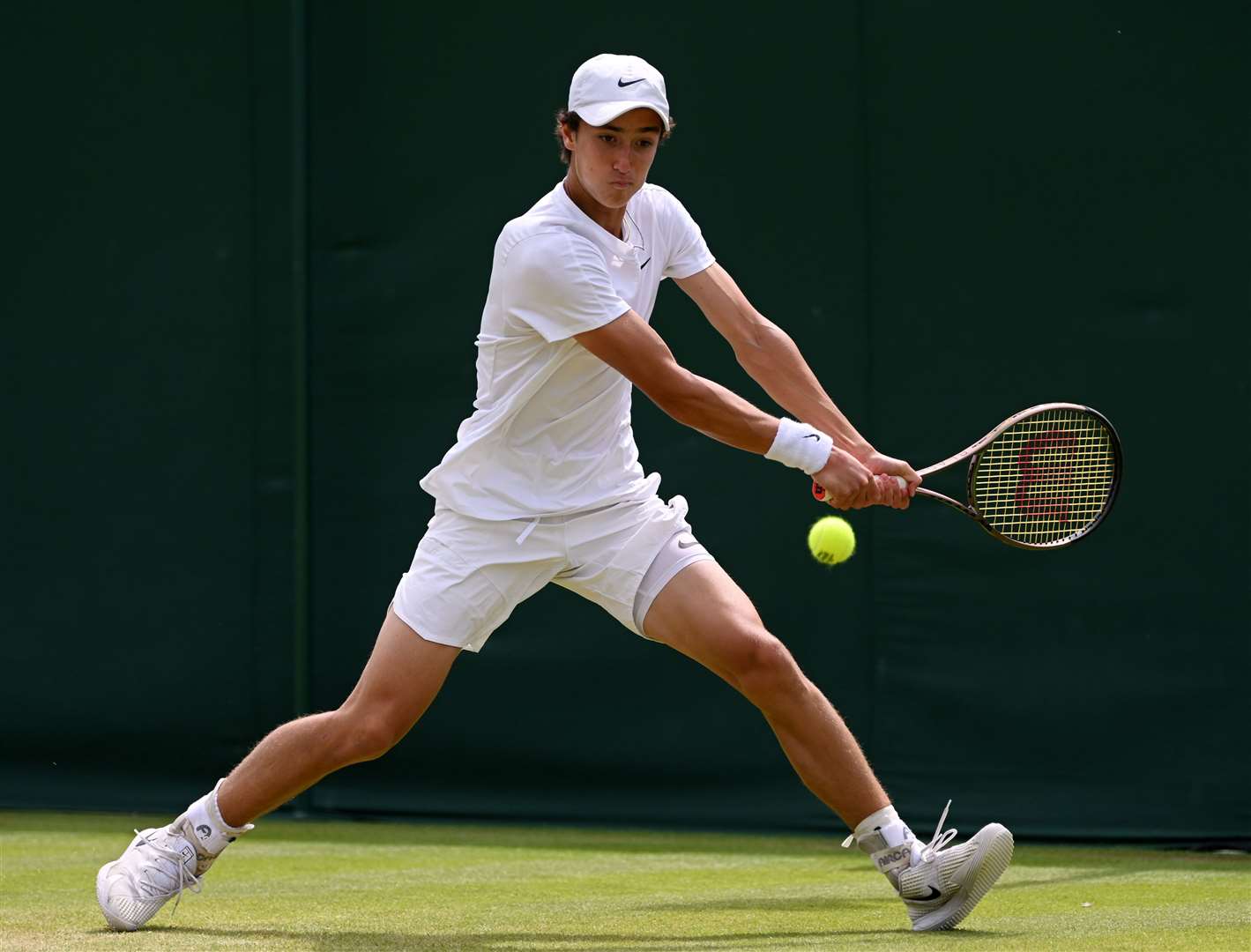 Dartford's Patrick Brady plays a backhand against Martyn Pawelski of Poland during their boys' singles first round match. Picture: Shaun Botterill/Getty Images