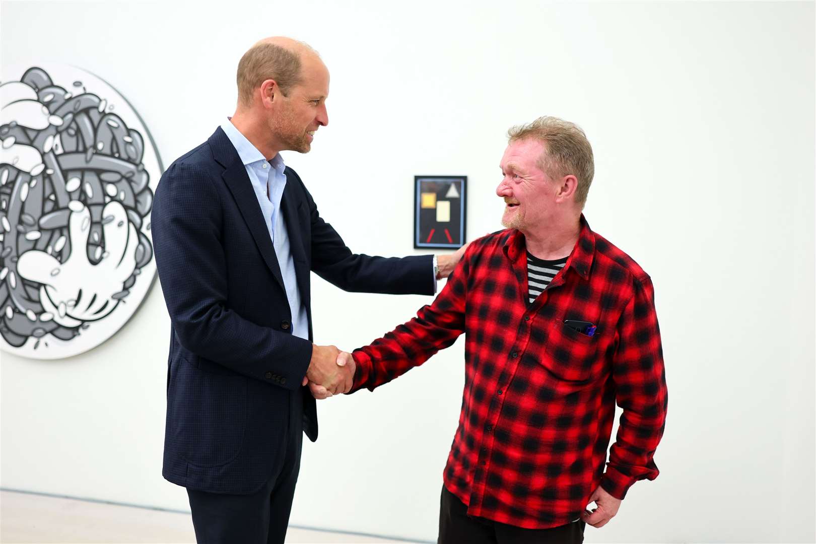 William catches up with Big Issue seller Dave Martin (Chris Jackson/PA)