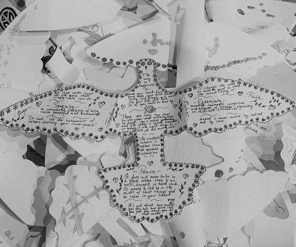 Peace messages on the hand-crafted paper doves. Picture: Gareth Jones