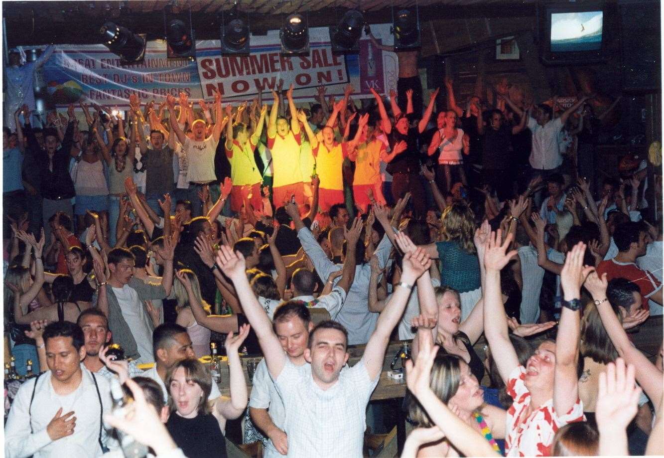 More than 800 Maidstone clubbers join in the Jumpin' Jaks world record attempt for the most people dancing to YMCA simultaneously in 2004