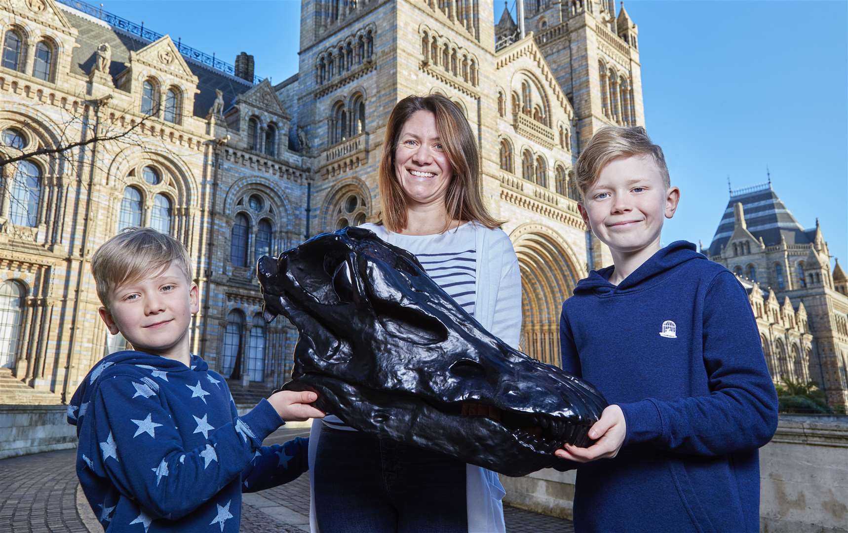 A 3D printed replica of Dippy’s skull is shown to museum visitors (Natural History Museum/PA)