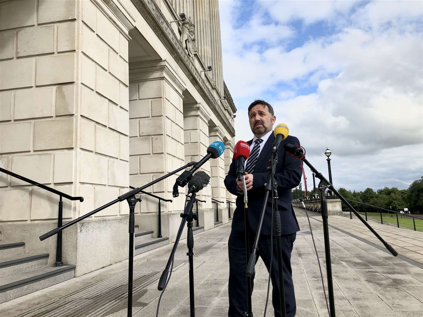 Health Minister Robin Swann outside Stormont in Belfast (David Young/PA)