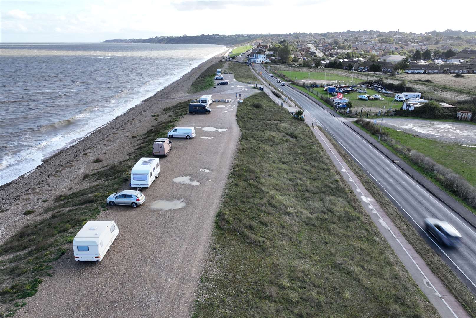 Caravans, campervans and cars parked up on the Shingle Bank in Minster. Picture: Phil Drew