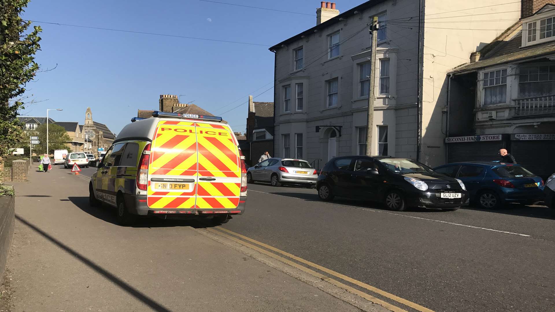 A police van was parked in Broadway