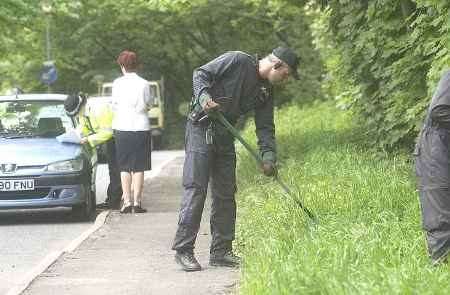 Police in search of clues at the scene. Picture: MATTHEW WALKER