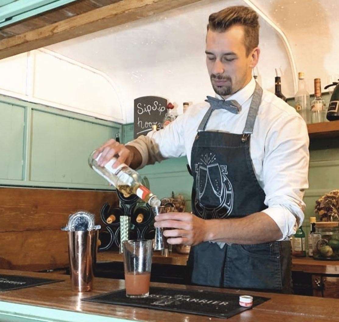 The Thirsty Farrier owner Dan mixes a cocktail