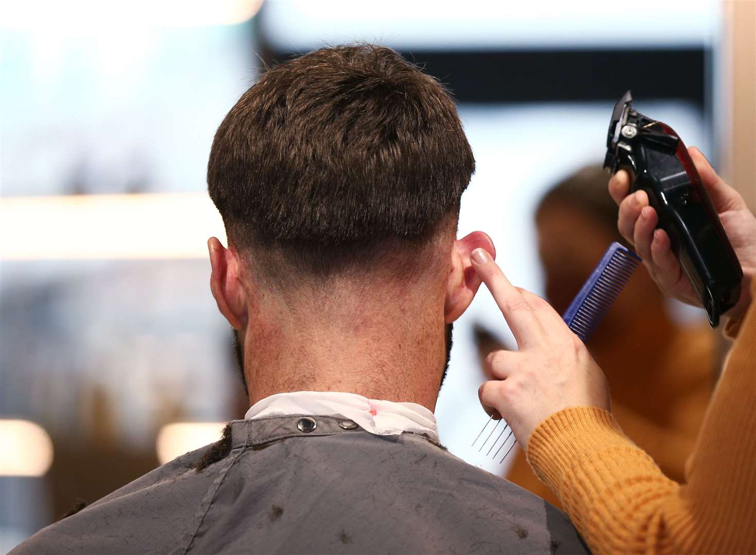 Hairdressers and barbers can reopen for appointments from Monday (Yui Mok/PA)