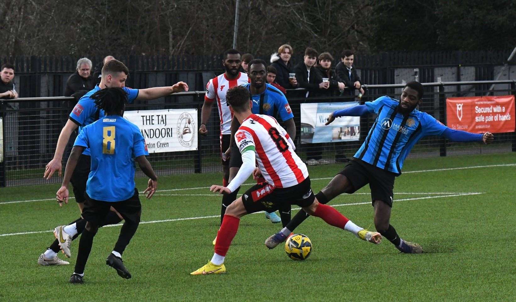 Sheppey's Connor Wilkins and former Ite, Helge Orome of Sevenoaks, get stuck in Picture: Marc Richards