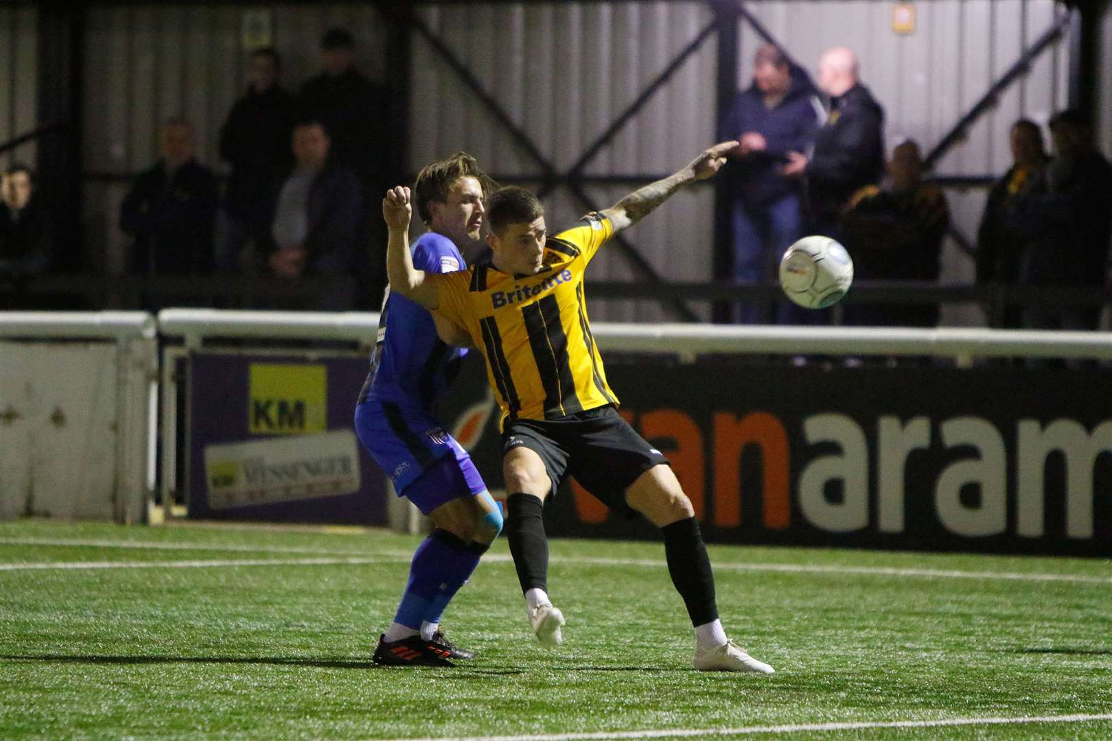 Ben Chapman up against Maidstone United midfielder Jack Paxman Picture: Andy Jones