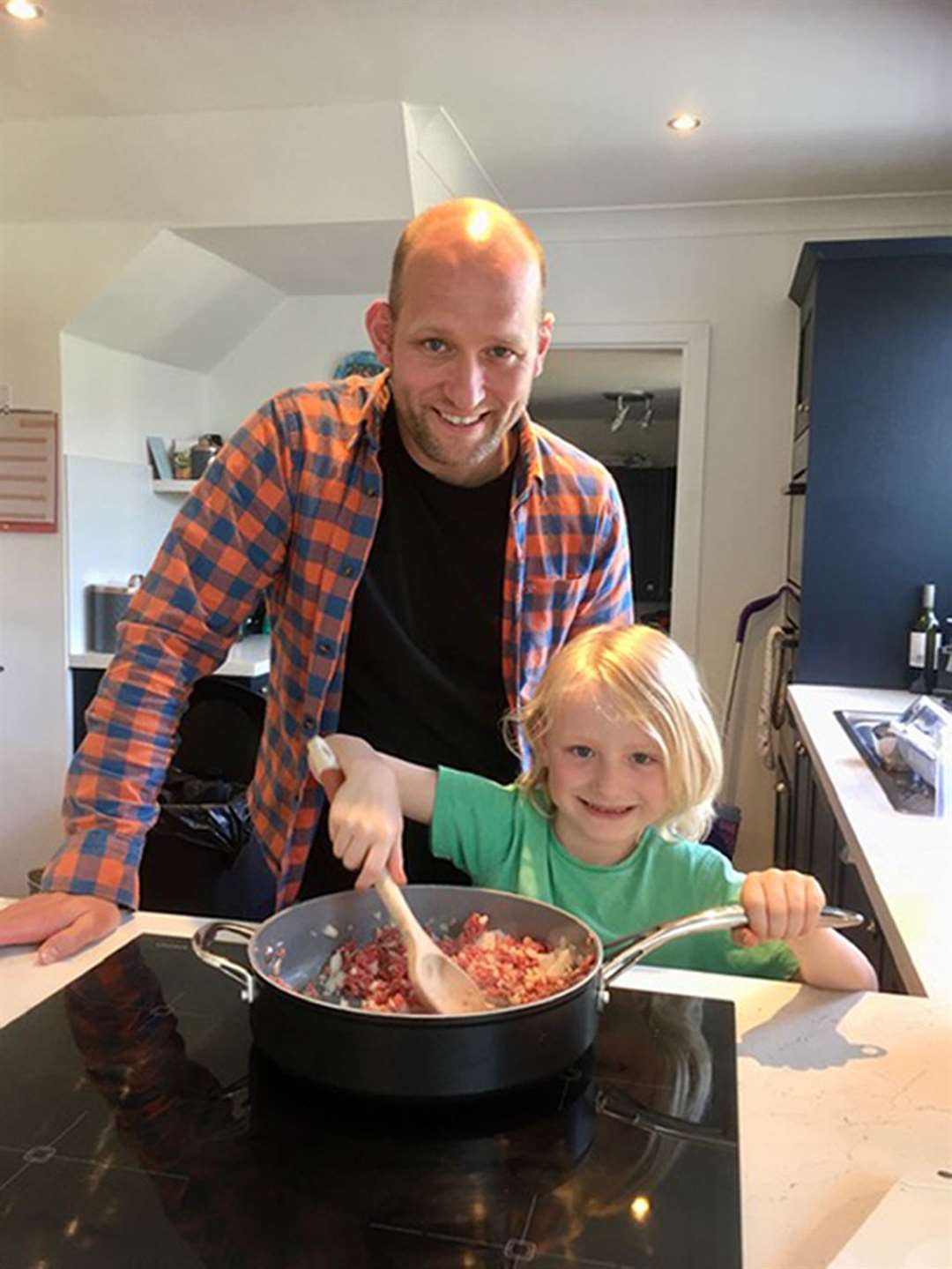 Arthur Dawson in the kitchen with his father, Antony (North Tyneside Council/PA)