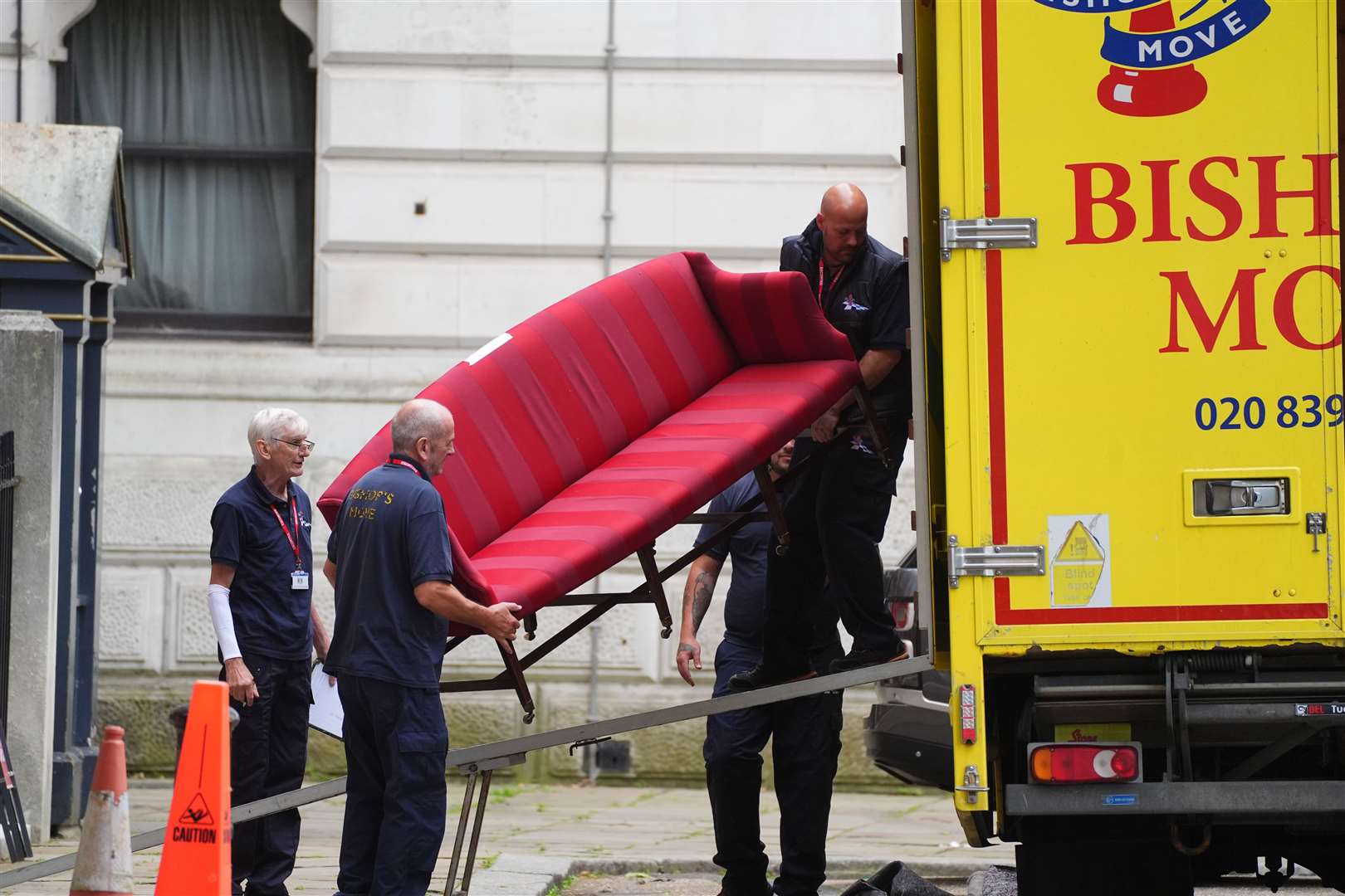 A sofa being loaded into the removal van at the back of Downing Street (James Manning/PA)