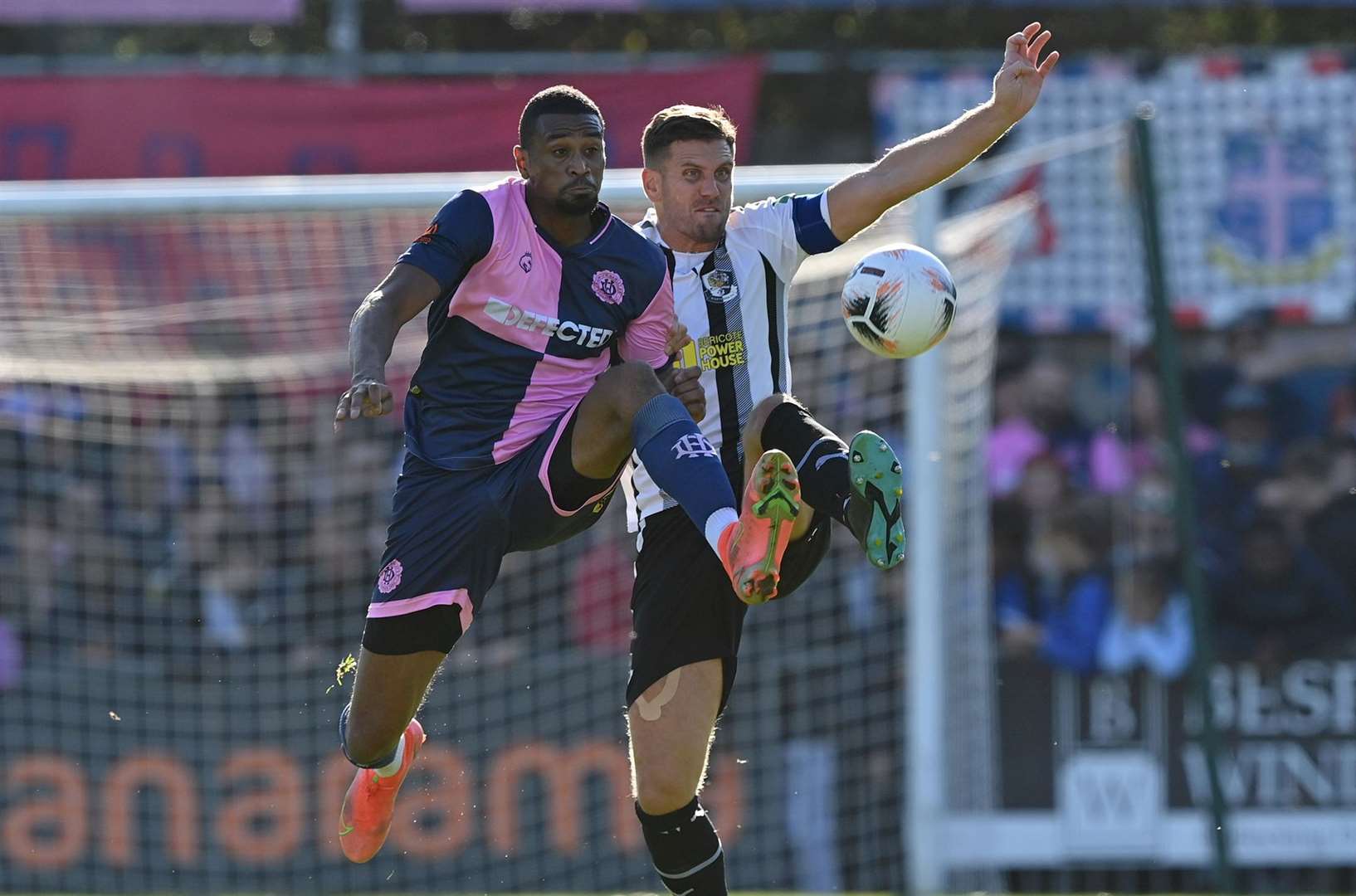 Tom Bonner in the thick of the action at Dulwich Hamlet last October. Picture: Keith Gillard.