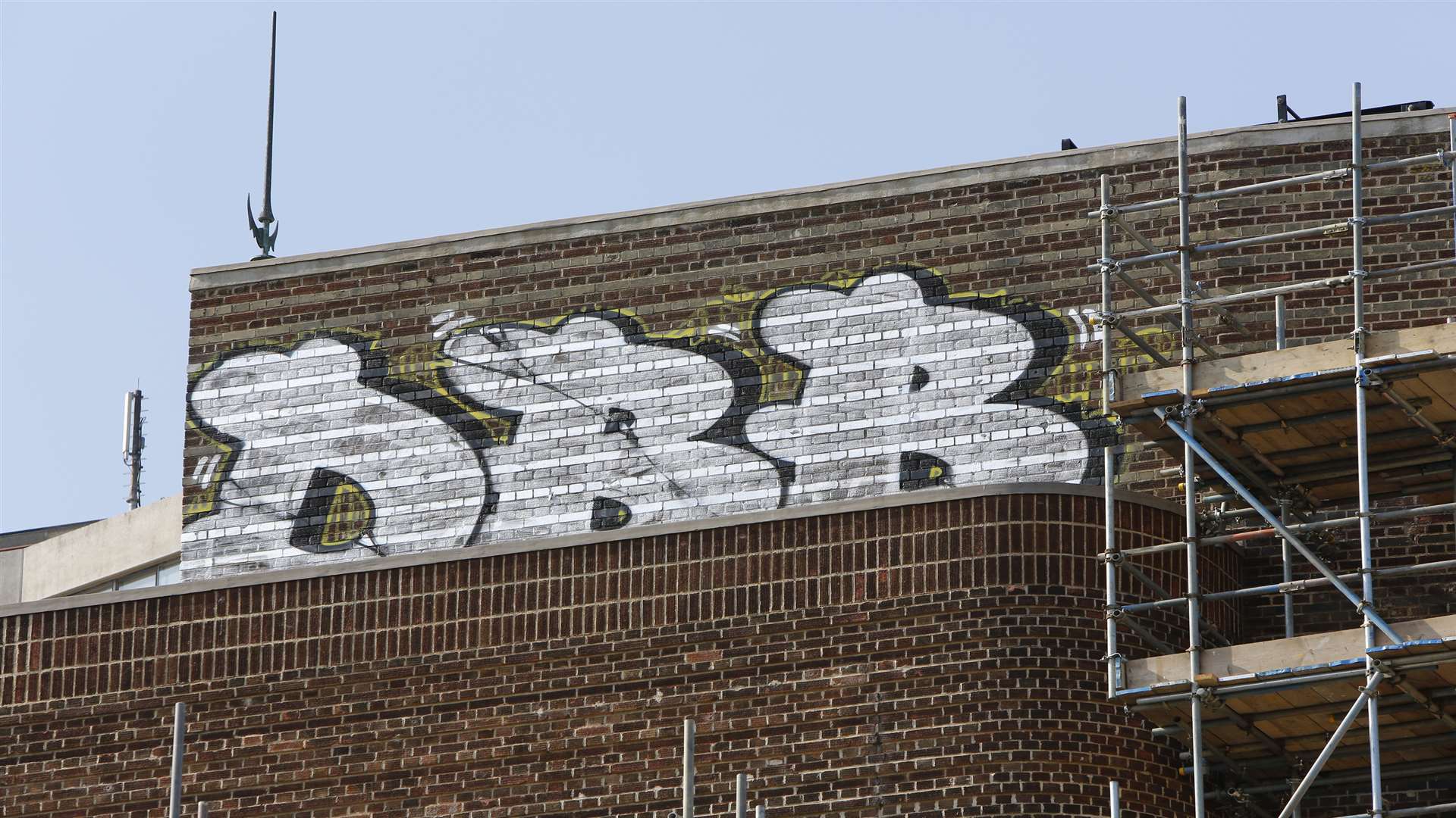 The building has been tagged in huge letters