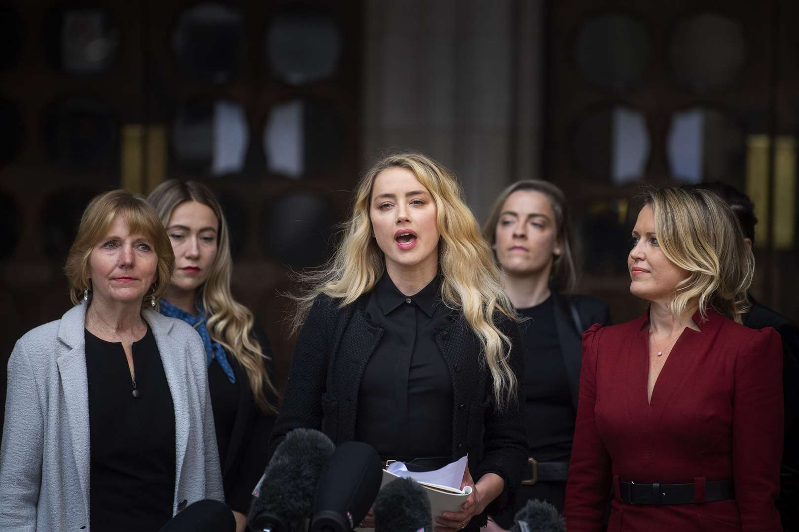 Amber Heard giving a statement outside the High Court in London in July 2020 (Victoria Jones/PA)