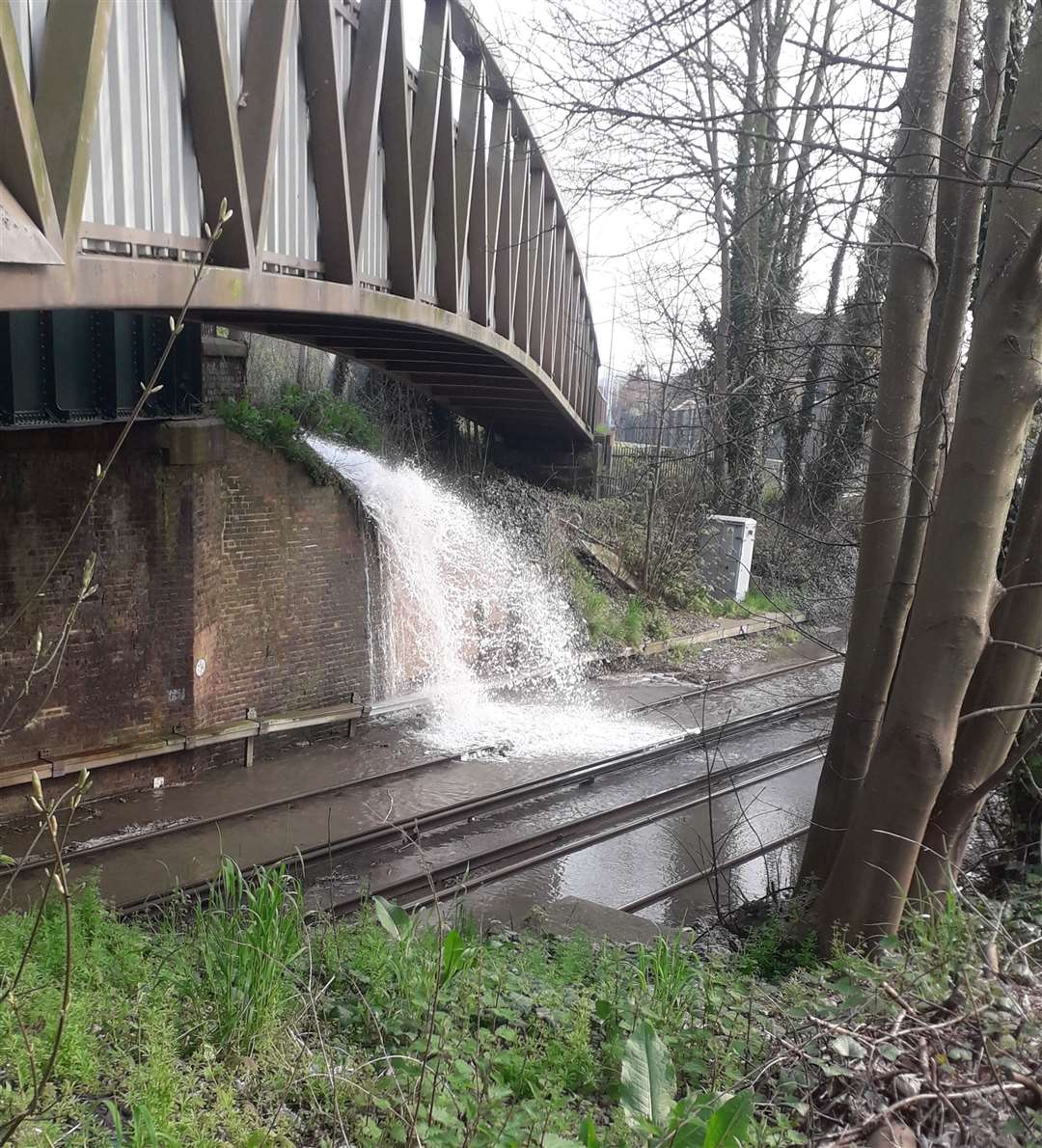 The water gushing on the line last Monday. Picture: Jason Kettle