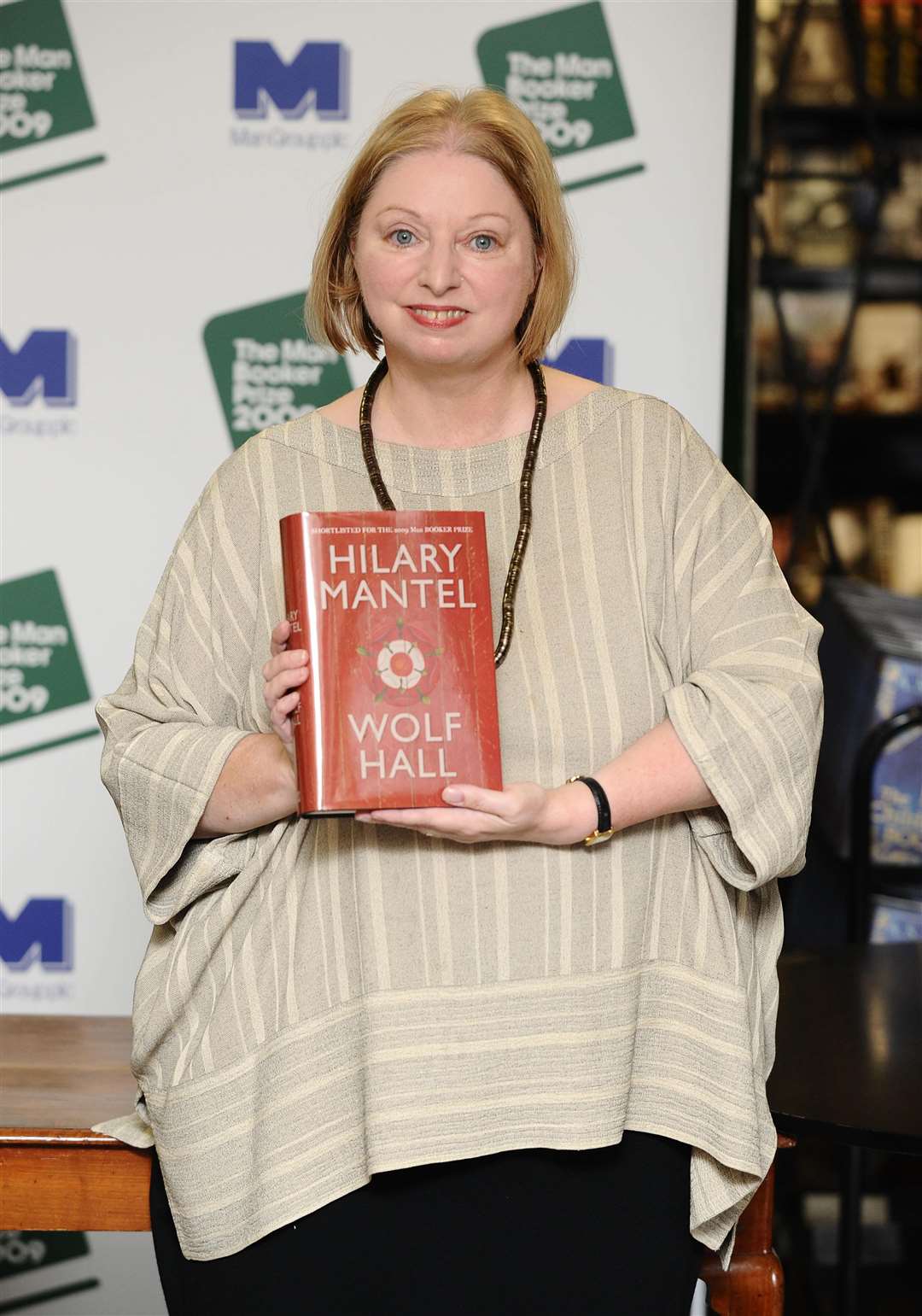 Dame Hilary Mantel with her acclaimed book Wolf Hall (Ian West/PA)