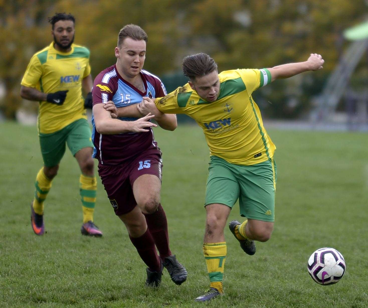 Medway Rovers 17 (green/yellow) hold off the attentions of Wigmore on Sunday. Picture: Barry Goodwin (42936805)