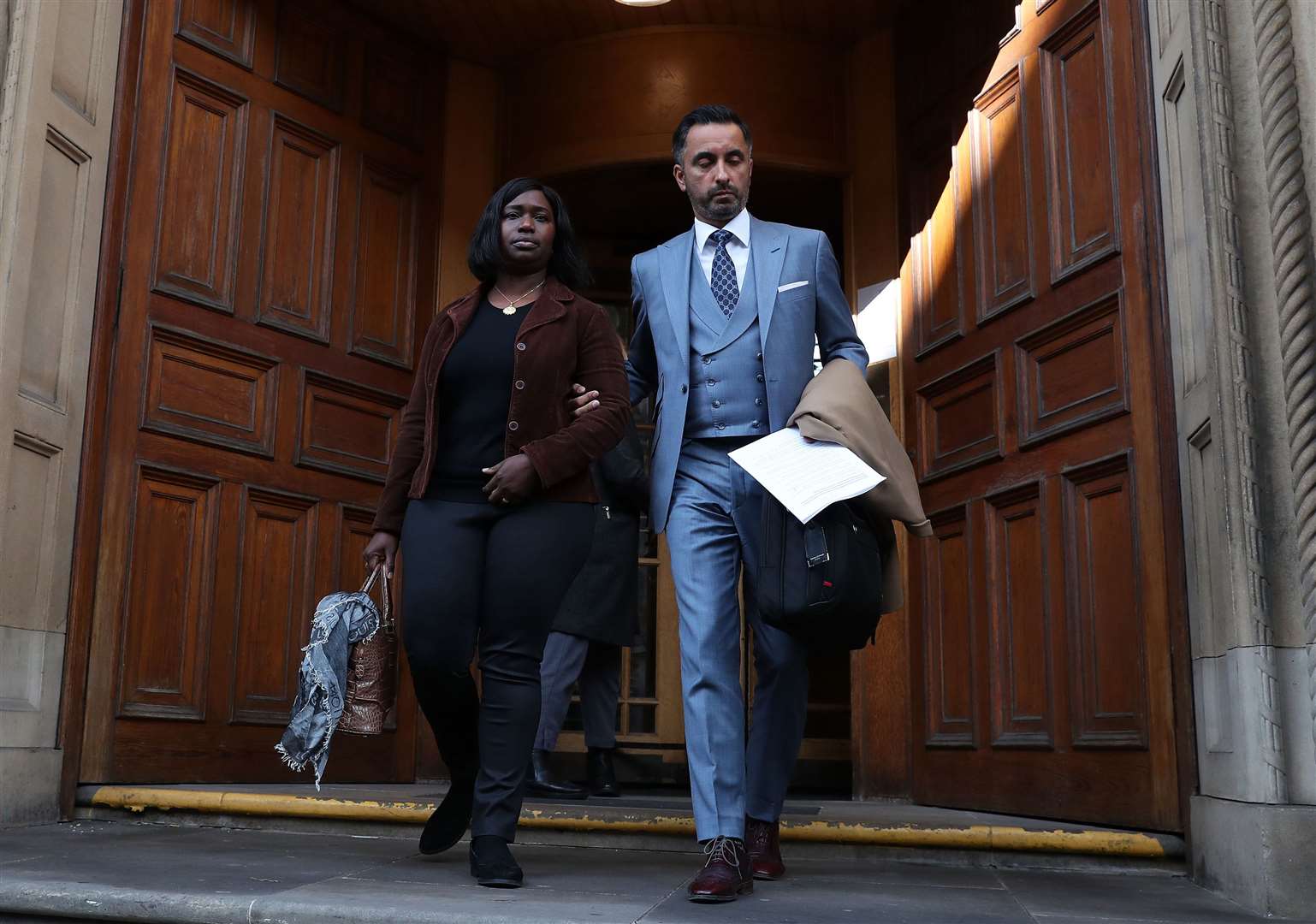 Kadijatu Johnson and lawyer Aamer Anwar (Andrew Milligan/PA)