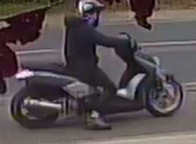 The pair made off on a grey motorcycle. Picture: Kent Police