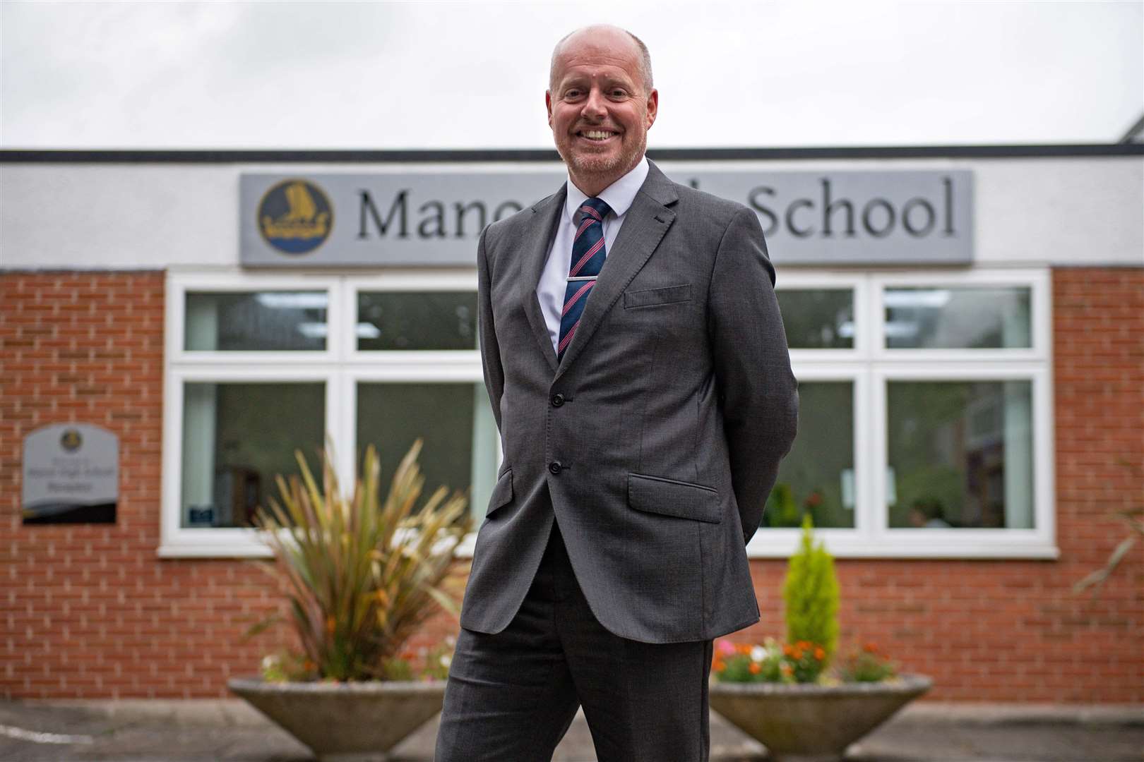 Headteacher Liam Powell outside Manor High School in Oadby (Jacob King/PA)