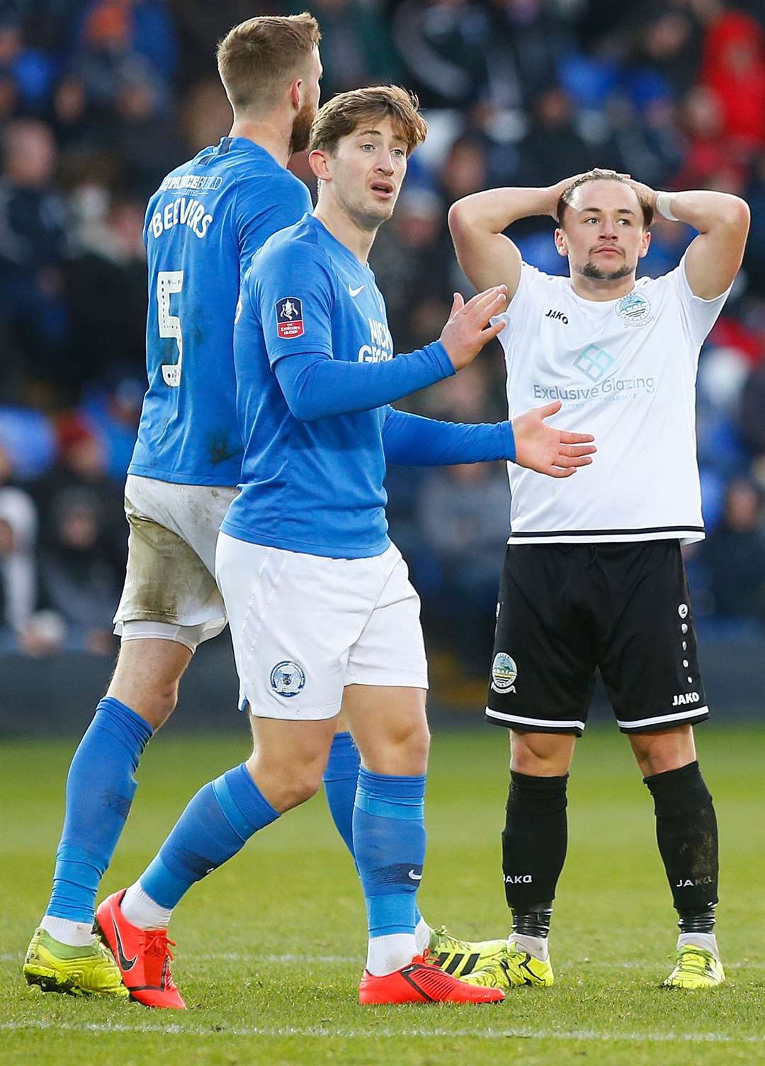 Dover midfielder Jack Munns holds his head in anguish after going close against Peterborough .Picture: Andy Jones