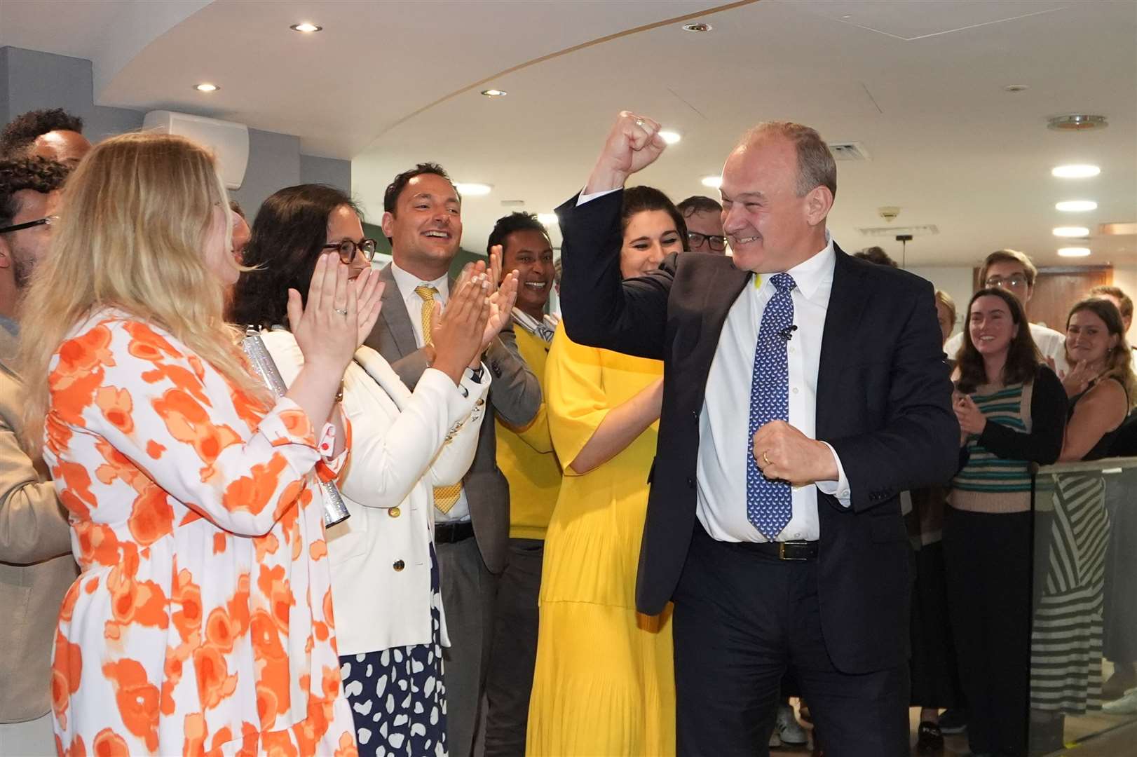 Sir Ed Davey is greeted by supporters at Lib Dem HQ (Gareth Fuller/PA)