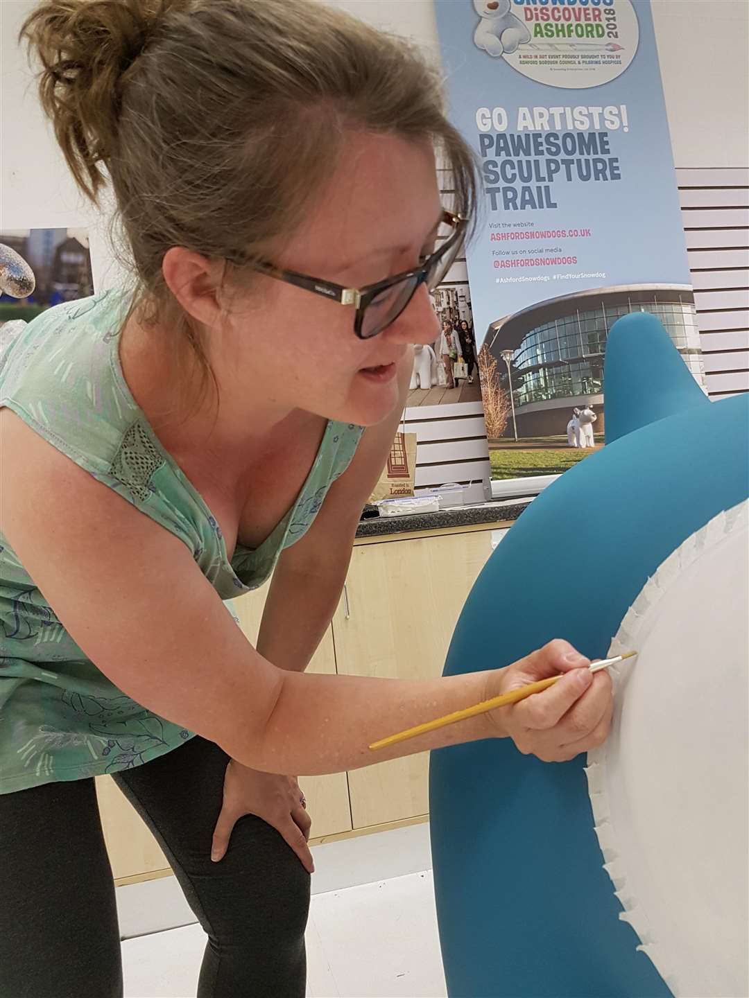 Emma Dove works on Zeus, one of her two Snowdogs. (4080446)