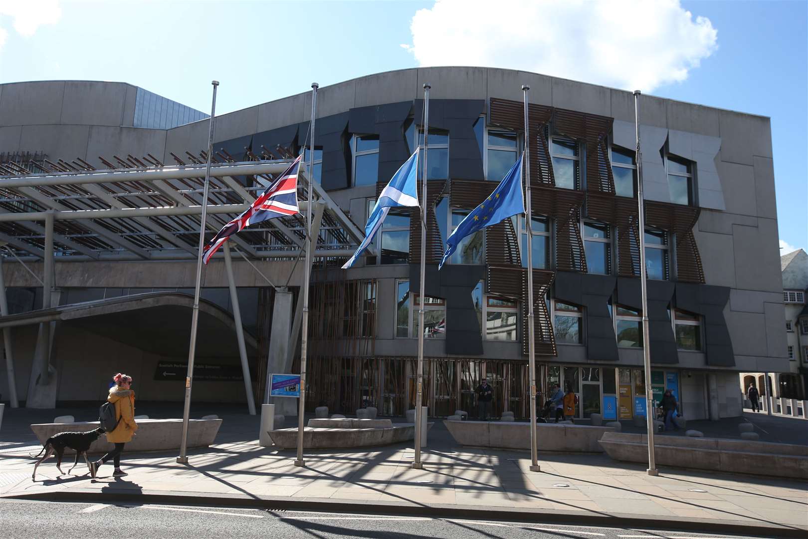 Flags fly at half mast outside the Scottish Parliament in Edinburgh (Andrew Milligan/PA)