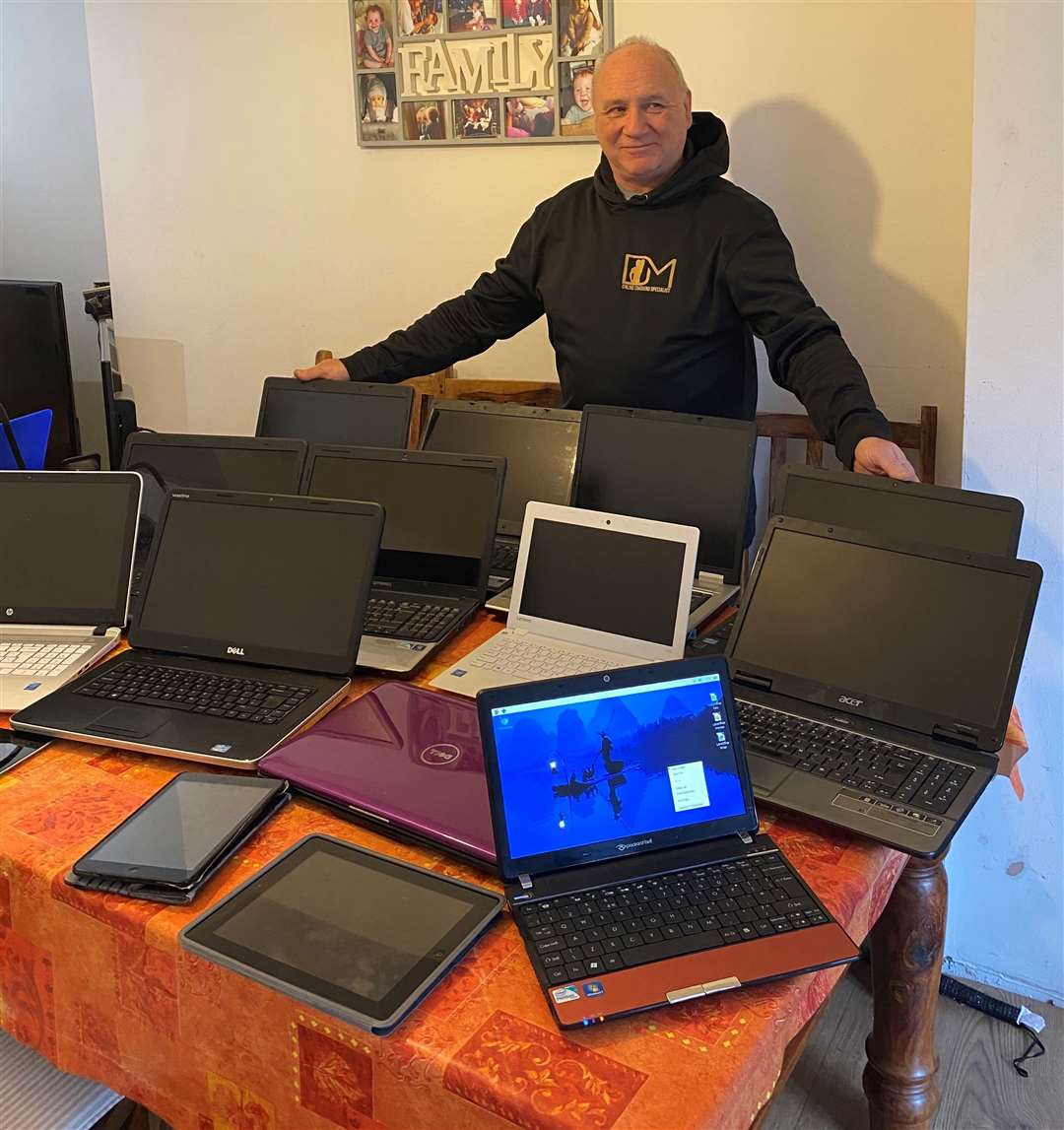 Steve Shears, of Marshall Road, Rainham has refurbished and donated over 15 devices to school children who don't have access to a computer at home. Picture: Steve Shears