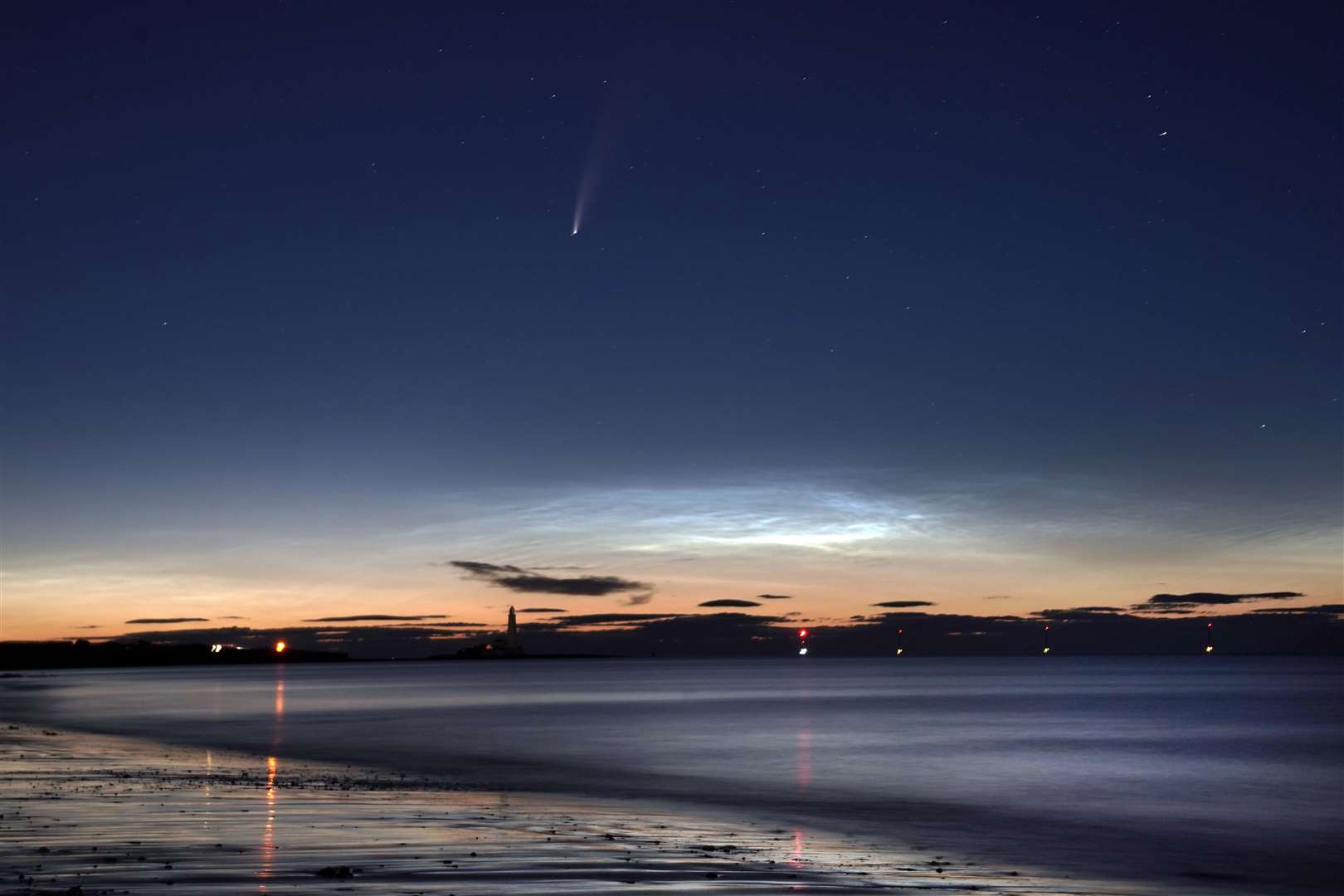 The noctilucent clouds were a bonus for the photographer (Owen Humphreys/PA)