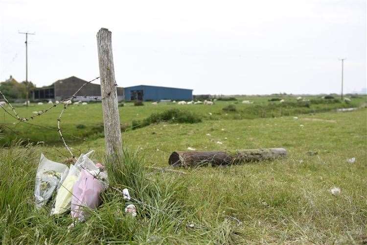 Floral tributes at the scene of the crash