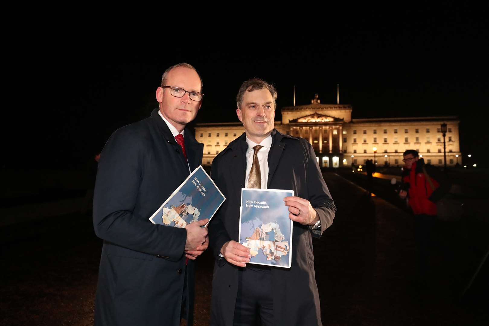 Simon Coveney and Julian Smith (Niall Carson/PA)