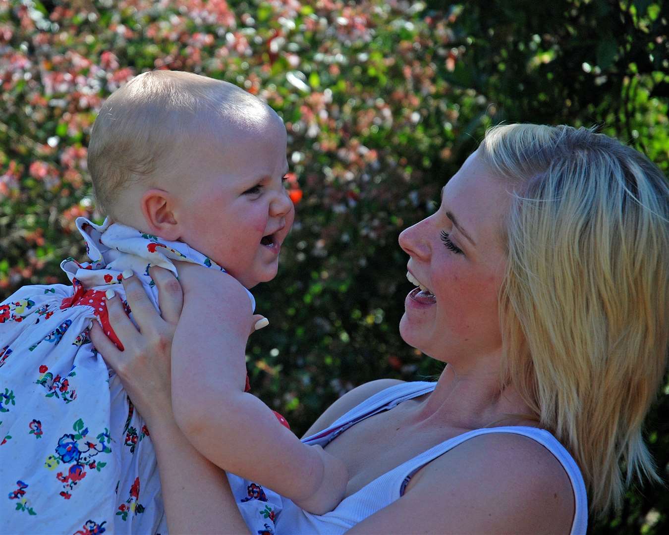 Young mum Louise Pottle, then aged 18, celebrates her exam results with daughter Ella in 2012