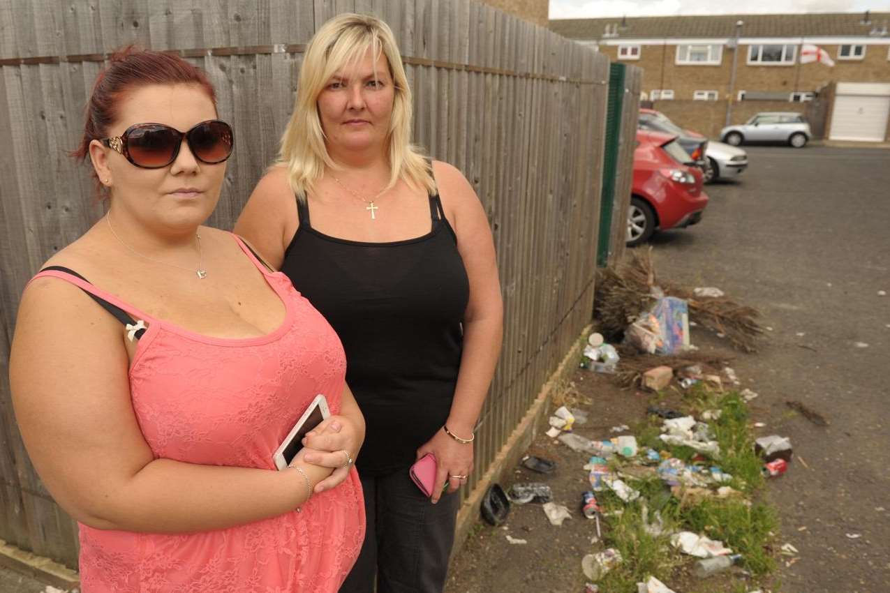 Michele Simmons and daughter Chloe at the spot where the dead dog was found