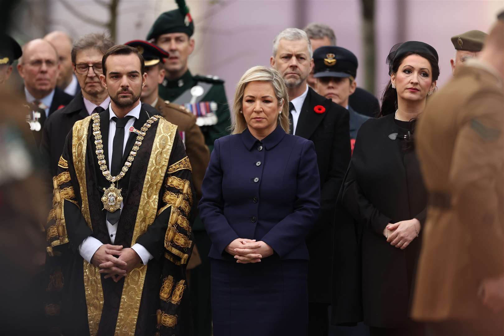 Lord Mayor of Belfast Micky Murray, left to right, First Minister Michelle O’Neill and deputy First Minister Emma Little-Pengelly attended the Remembrance Sunday service at Belfast City Hall in November (Liam McBurney/PA)