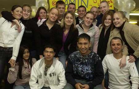 REUNITED: Amin, front centre, back with his fellow pupils